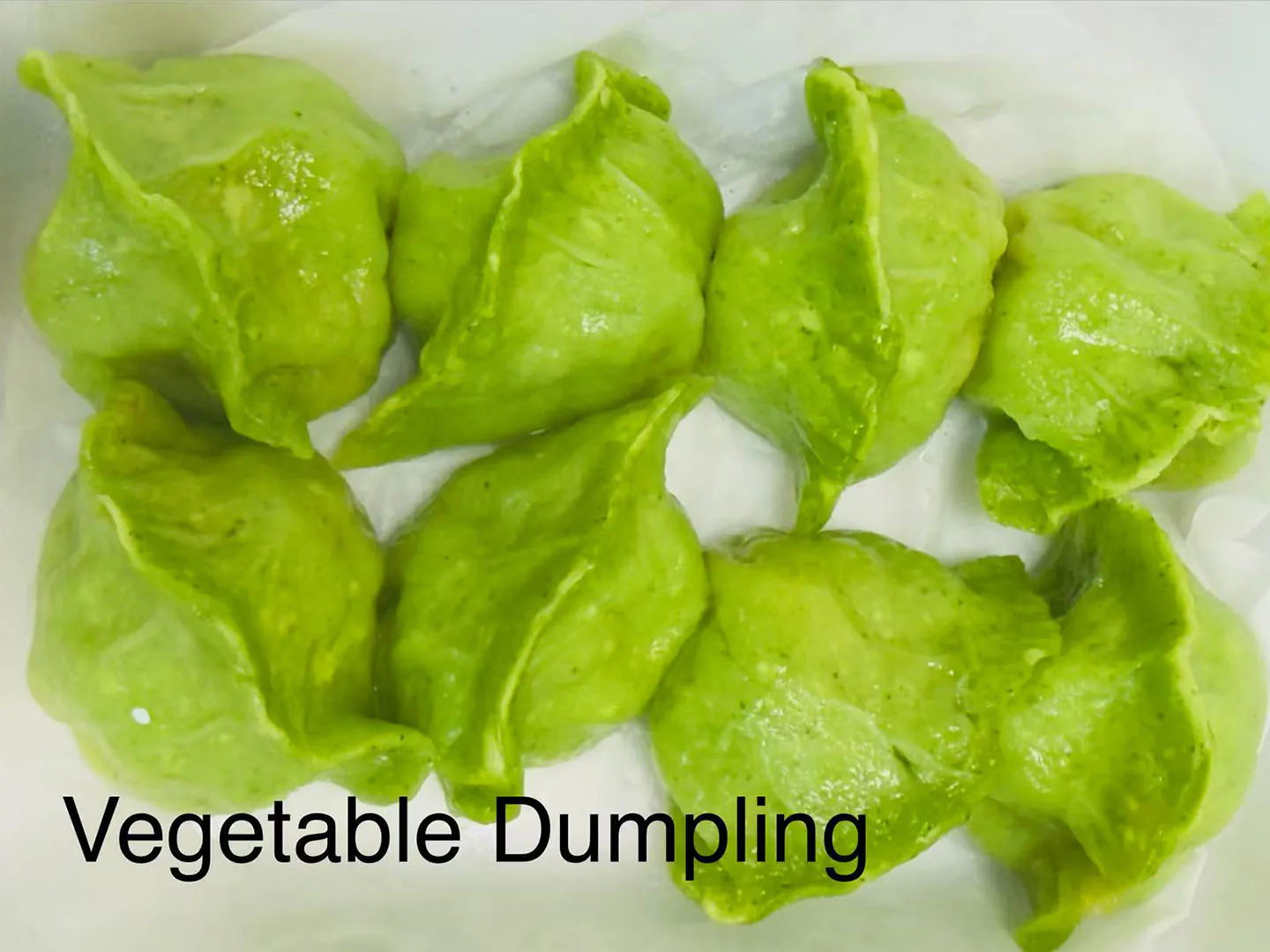 Fresh veggie dumplings with spinach wrapper at Xiao Ling's Noodles & Dumplings, a Chinese Restaurant in The Colony