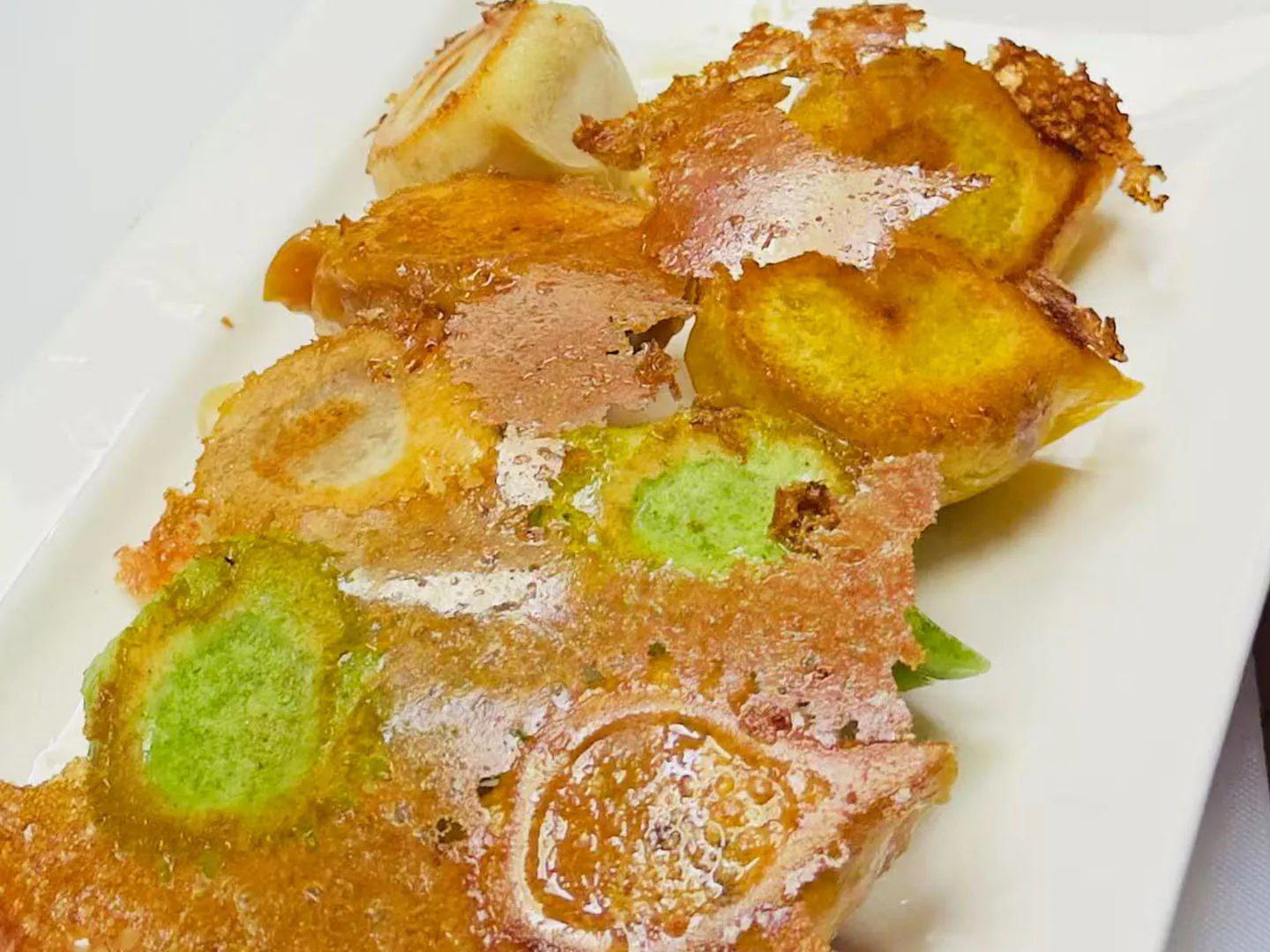 Golden crispy-bottomed dumplings at Xiao Ling's Noodles & Dumplings, a Chinese Restaurant in The Colony